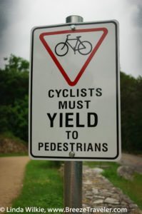 Cyclists Must Yield To Pedestrians Sign